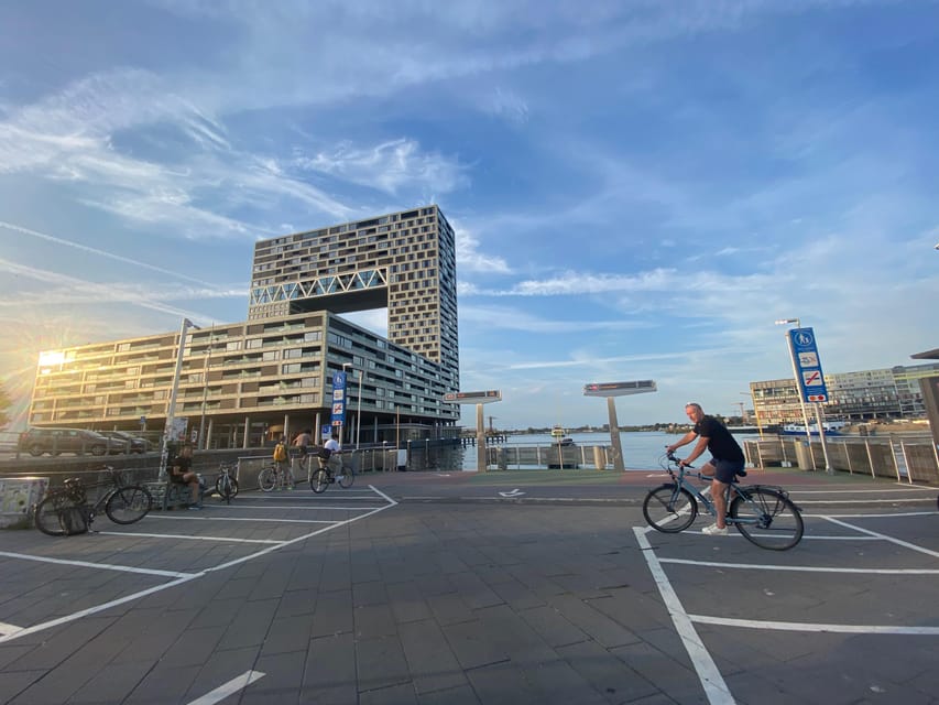 Amsterdam: Urban Bike Tour, Graffiti Art & Magnet Fishing - Crossing the IJ to Amsterdam Noord