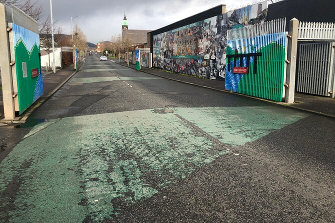 Black Taxi Tour of Belfast – Politics, Murals peace walls Tour - Bombay Street and its Memorial Garden