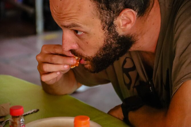 Cancun Walking Food Tour: Local Food, Markets, and Street Art. - Fresh fruit and local drinks at Av Sunyaxchen 73