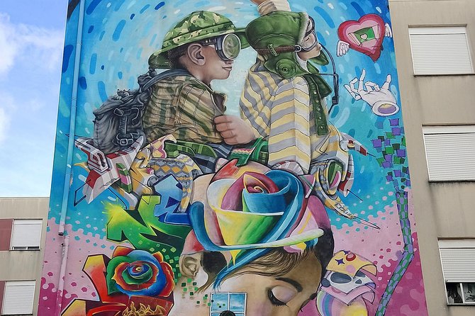 Discover Lisbon's Best Street Art - Starting at Hard Rock Cafe and entering the old quarters