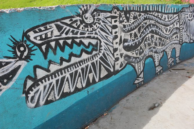 Graffiti Tour in La Candelaria Bogotá with Transportation - Journalists Park and the final stop at Café Herencia