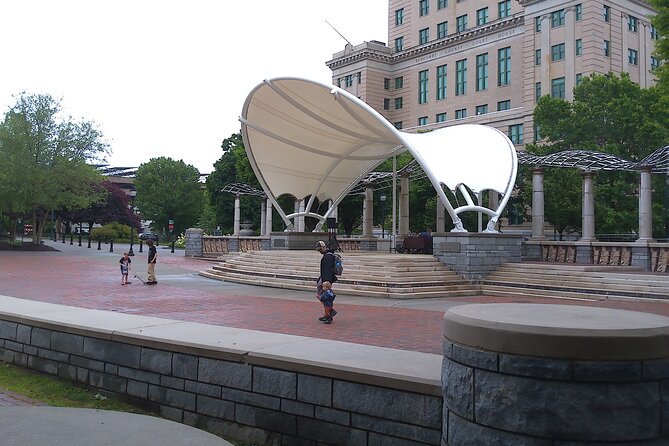 Guided Asheville E-bike Tour of River Arts, Mountains and Murals - Returning through Carrier Park and the city’s past