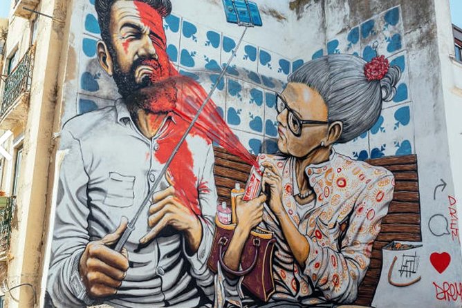 Kickstart Street Art Tour in Lisbon - The Shepard Fairey and Vhils piece