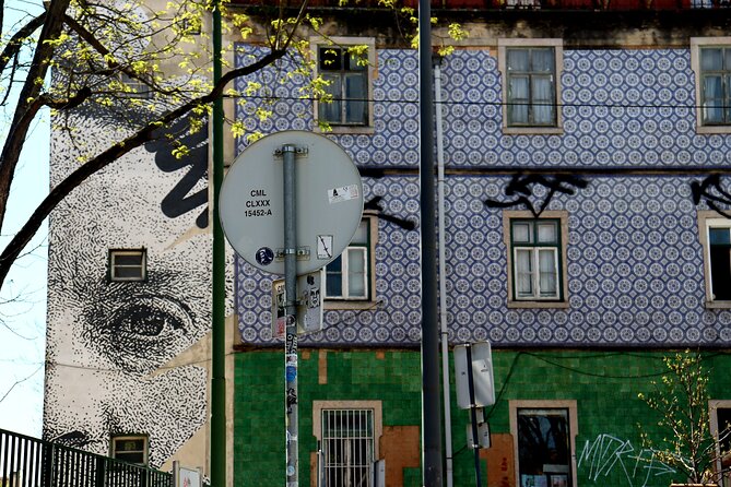 Lisbon Street Art and Lookout Point Tour - The Roman Theatre and art on a historic wall