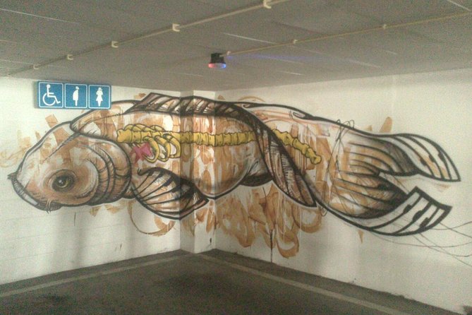 Lisbon Street Art Walking Tour - Graça: hills, murals, and city views