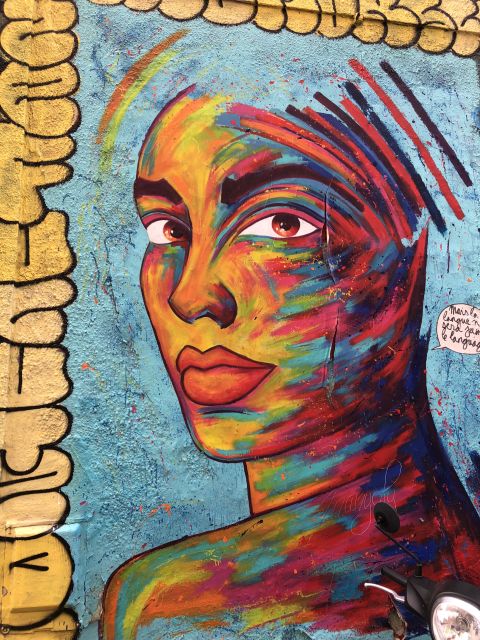 Marseille: Street Art Walking Tour and Local Drink - Marseille details between the murals