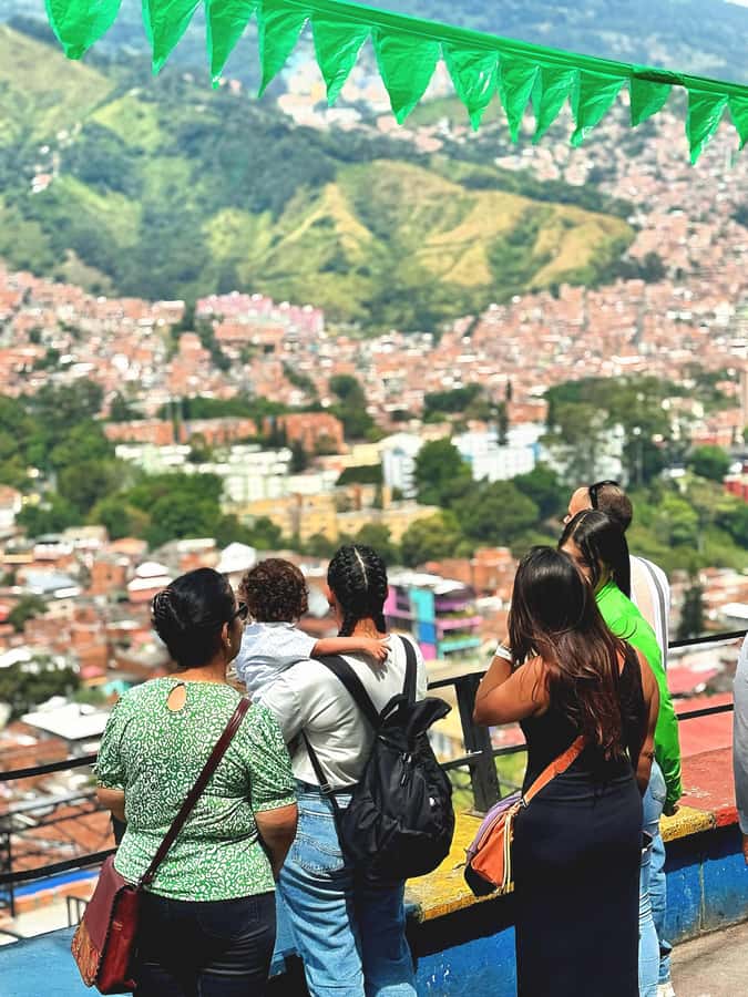 Medellín Comuna 13 local guides snacks and your own graffiti - The escalator project and the uphill route
