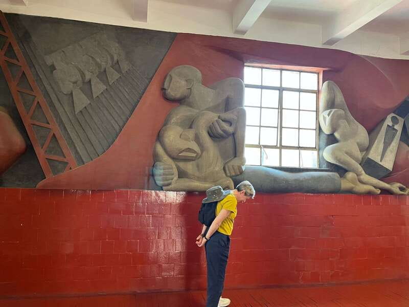 Mexico City: History on Walls. Mexican Murals Walking Tour - A wartime mural in a former colonial palace