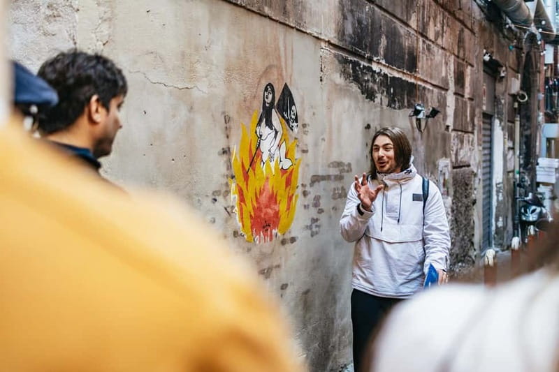 Naples: Spanish Quarters Folk Street Art w/ Sweets Tasting - Reading the first murals and narrow lanes