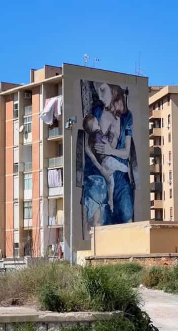Palermo: Street Art and Urban Life Walk - Reading murals by TVBoy and SID