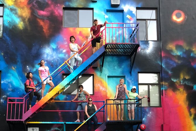 Sacramento Street Art Walking Tour - See the Murals Sacramento is Famous For - Looking up with binoculars
