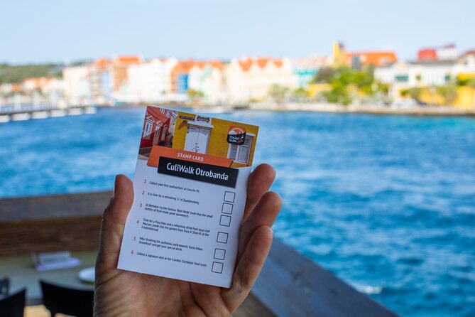 Taste of Otrobandai: Self-Guided Food & Culture & Murals Tour - Crossing the Queen Emma Pontoon Bridge