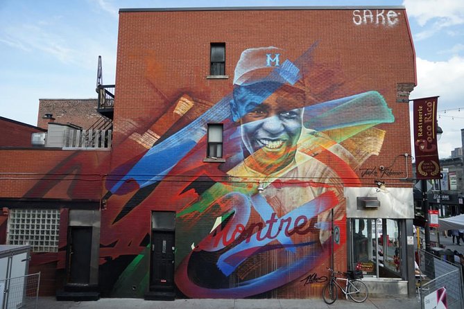 The Original Montreal Mural Arts Tour by Spade & Palacio - Saint-Laurent Boulevard and the main mural corridor
