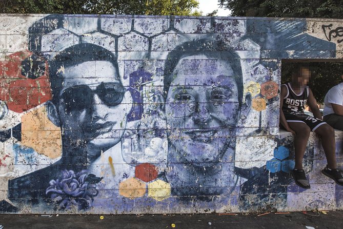 Torpignattara Photo Tour: melting pot, street art and politics - Murals, writing, and the art between the buildings