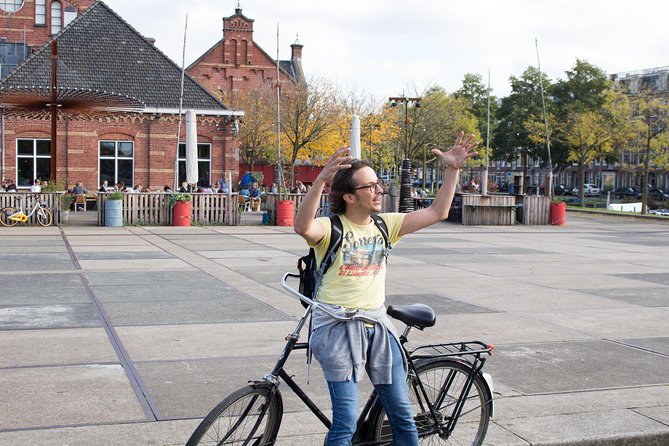 Urban Adventures Amsterdam Bike Tour, Graffiti and Magnet Fishing - Pllek brings a rough-edged stop in Noord