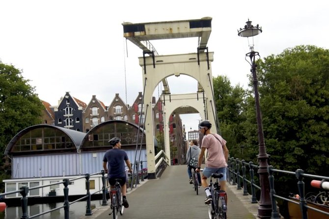 Urban Adventures Amsterdam Bike Tour, Graffiti and Magnet Fishing - Prinseneiland brings quiet canals and tiny bridges
