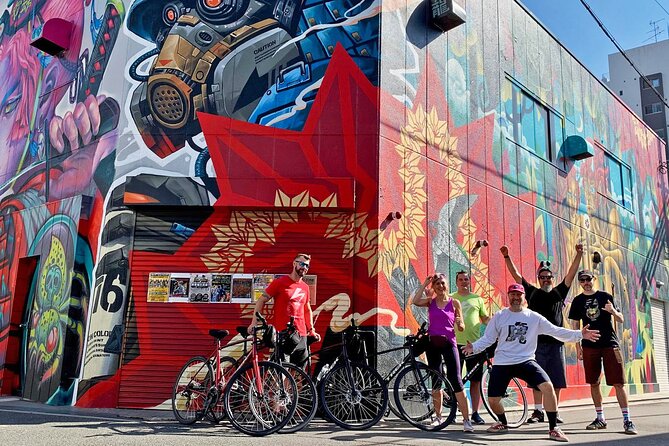 Urban Canvas: Osaka Street Art Bike Tour - Nakazaki-cho shifts from grit to galleries